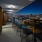 Resident lounge at our apartments for rent in Nashville, featuring leather seating and a long table with chairs.