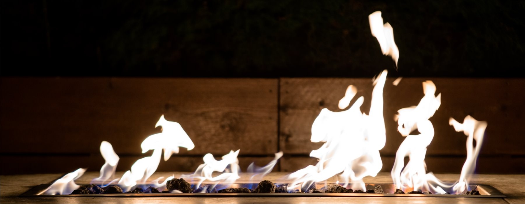 lifestyle image of flames in a fireplace